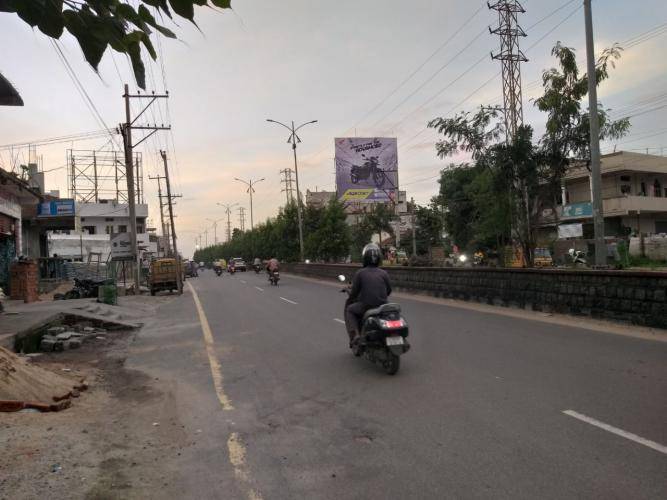 Billboard - Naka Chowrasta facing -Godavarikhani Road, Karimnagar, Telangana