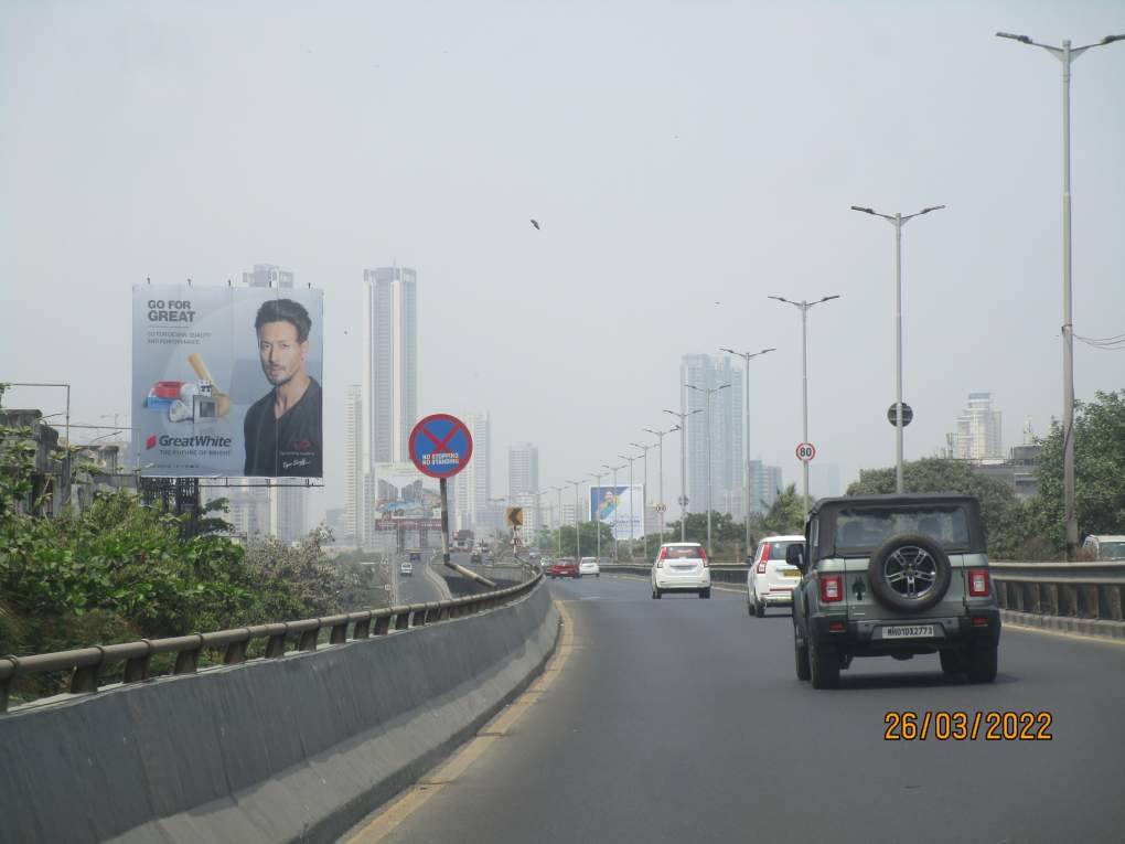 hoarding - Eastern freeway near Mazgaon (Byculla)LHS 3rd Abhilasha building-E/T - near Mazgaon,   Eastern Freeway,   Mumbai,   Maharashtra